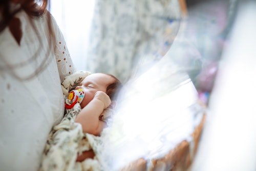 sleeping-newborn-girl-in The First 2,190 Days Of Parenting