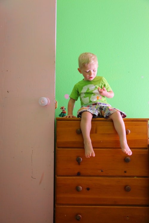 small-child-sitting-on Anchoring Furniture Can Save A Child's Life: Consumer Reports Found The Best Kits