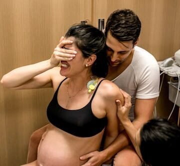doula-husband-helping-pregnant How Does Childbirth Compare To The Most Dangerous Jobs In America?