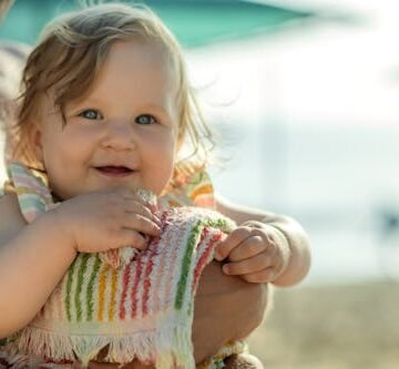 baby-girl-her-father 12 Unique Nature Names For Girls, From Elowen To Miki & More