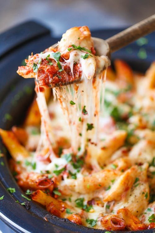 slow-cooker-chicken-parmesan 11 Crockpot Chicken Dinners For High-Protein, Easy Weeknight Meals