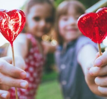 two-children-with-lollipops FDA Bans Red Dye 3 From Food