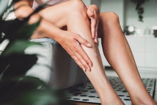 caucasian-woman-applying-body Why Are My Legs So Itchy All The Time?
