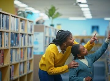 girl-library-sister-help South Dakota Bill Threatens Jail Time For Librarians