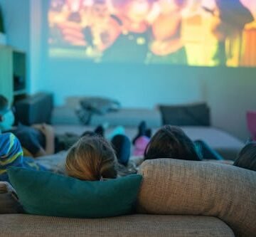 gettyimages-1989625402 Let’s Talk Movie Night At Home Ideas, Because The Theater Is Hella Expensive