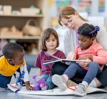 a-daycare-teacher-sits ACLU Sues Trump Administration After Attacks On Head Start Program