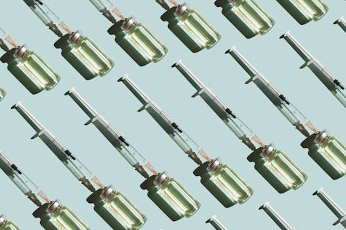 pattern-of-vials-syringes Compounded GLP-1s Are Going Away. Here's What To Do If You Take Them.