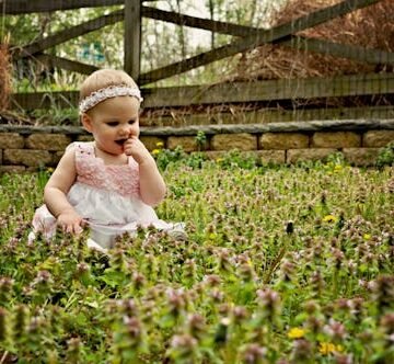 spring-flowers-birthday-girl 23 Sweet Baby Girl Names That Are Dainty, Feminine, & Playful