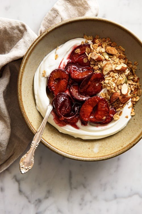 roasted-plum-compote-1 11 Recipes To Use Up Yogurt, So You Can Finish The Giant Tub In Your Fridge