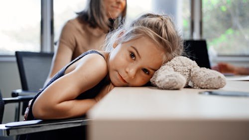 little-girl-rests-head Research Suggests More Children Have Long Covid Than We Thought — Thought The Symptoms Are Different