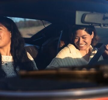 two-friends-on-vacation The Best Podcasts For Summer Road Trips