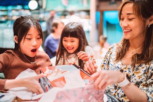 a-delighted-teenage-girl Bring Back Opening Presents At Birthday Parties