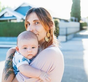 a-mother-with-tattoos 16 Gen Z-Inspired Baby Names That Are All Vibes, No Logic