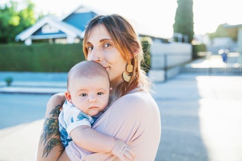 a-mother-with-tattoos 16 Gen Z-Inspired Baby Names That Are All Vibes, No Logic