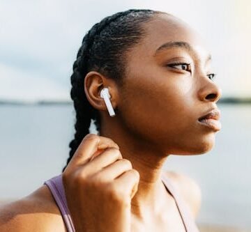 gettyimages-2213645887 Are AirPods Bad For You? What Science Says About The "Mini Microwave" Myth