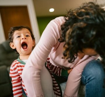 Overstimulation & Motherhood Go Hand-In-Hand. Here's How To Ease It.
